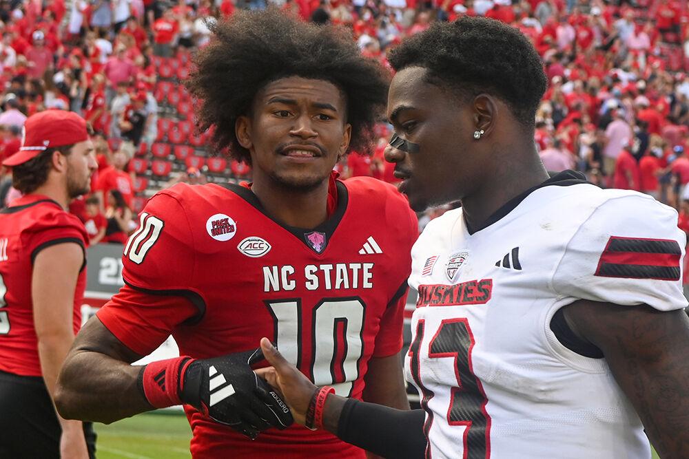 Sophomore wide receiver Kevin Concepcion shakes hands with a Northern Illinois player after the football game against Northern Illinois at Carter-Finley Stadium on Saturday, Sept. 28, 2024. Concepcion scored one touchdown. The Wolfpack beat the Huskies 24-17.