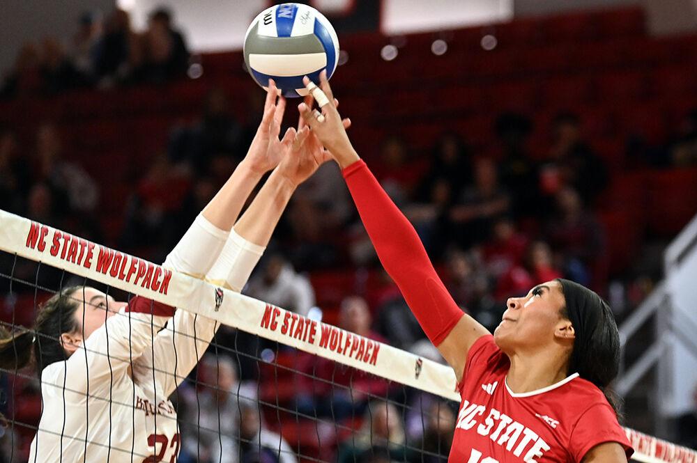 Junior middle blocker Jada Allen tips the ball back over the net during the match against Boston College in Reynolds Coliseum on Friday, Nov. 3, 2023. Allen had four kills and three block assists. NC State lost to Boston College 3-2.