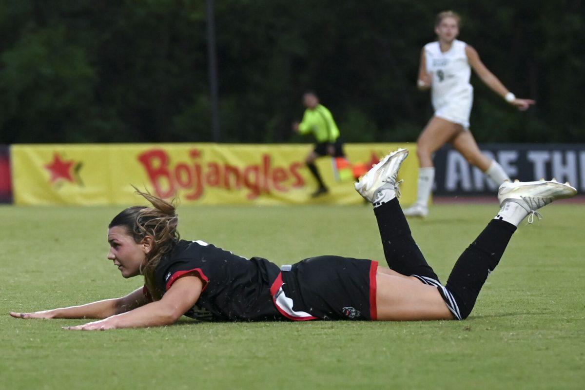Graduate midfielder Abi Hugh slides after being fouled from the left during the match against William &amp; Mary at Dail Soccer Field on Thursday, Sept. 12, 2024. Hugh attempted three shots for the Wolfpack. NC State lost to William &amp; Mary 1-0.