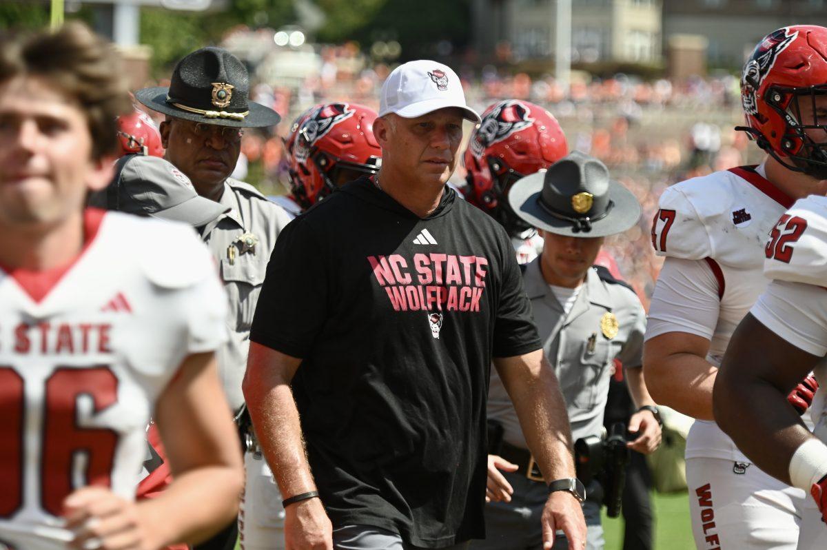 NC State football head coach Dave Doeren walks into the visitor tunnel during halftime against Clemson in Memorial Stadium on Saturday, Sept. 21, 2024. At halftime, NC State was down 45-7.&#160;Clemson beat NC State 59-35.