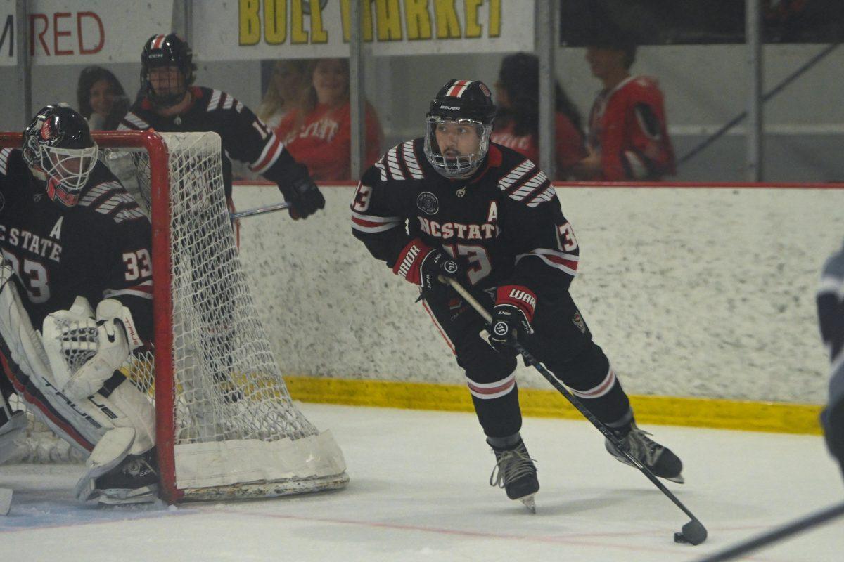 Junior defenseman Nick Librizzi steals the puck during the game against High Point University at Invisalign Arena on Friday, Sept. 6, 2024. Librizzi scored one goal during the game. NC State won 8-2.