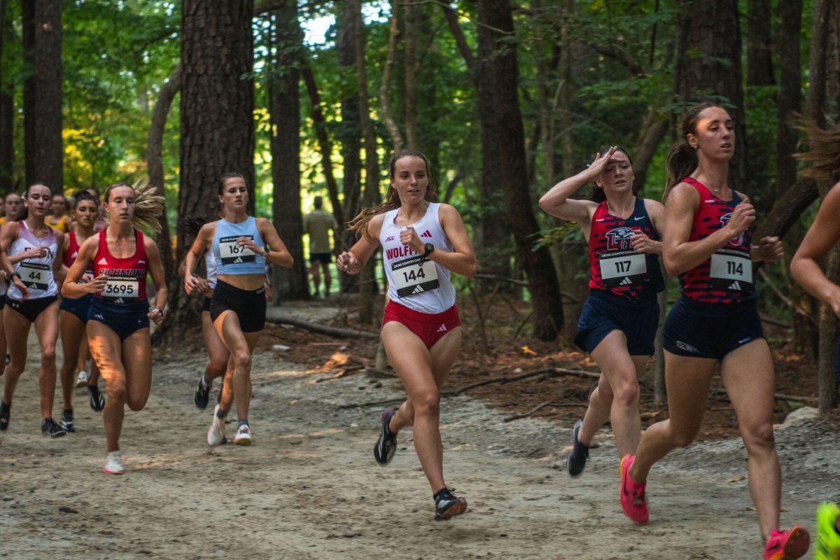 Junior Olivia Haas makes her way through the forest loop during the Adidas XC Challenge at WakeMed Soccer Park on Friday, Sept. 20, 2024. Haas finished with a time of 18:19.6. The NC State women's team finished in first place with a total of 34 points.