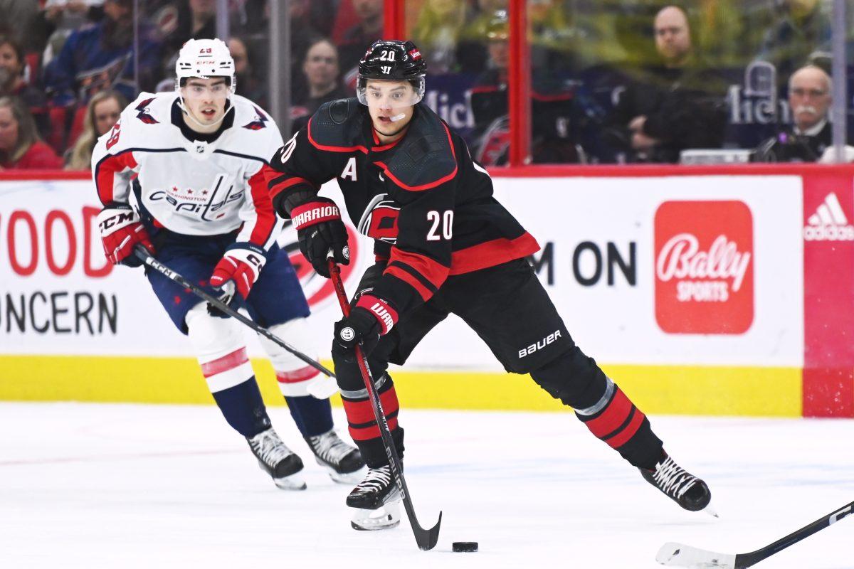 Center Sebastian Aho passes the puck during the Carolina Hurricanes game versus the Washington Capitals at PNC Arena on Friday, April 5, 2024. Aho scored one goal for the Hurricanes. The Hurricanes beat the Capitals 4-2.