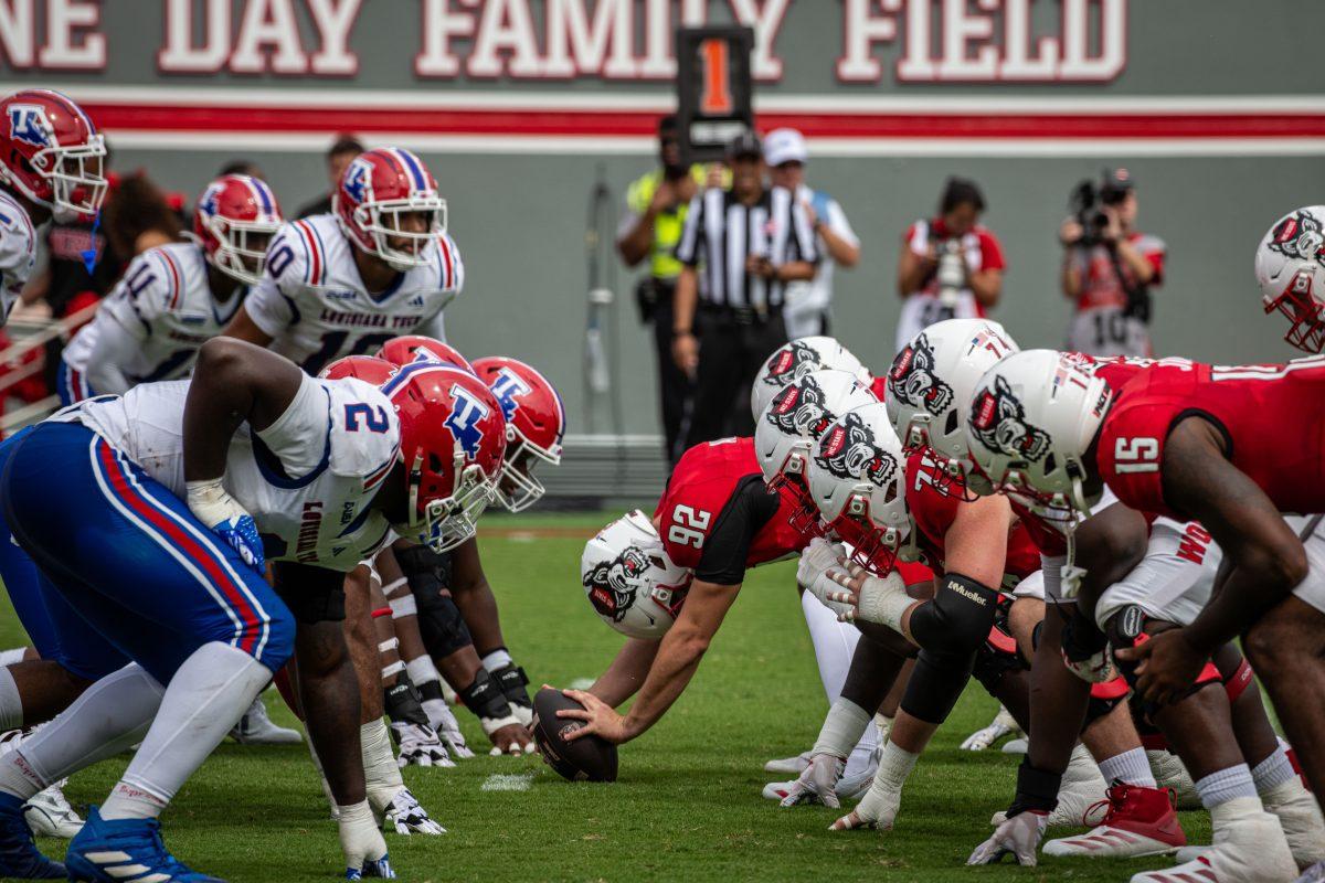 Junior tight end Jack Cook prepares to snap the ball during the game against LA Tech at Carter-Finley Stadium on Saturday, Sept. 14, 2024. The Wolfpack beat the Bulldogs 30-20.