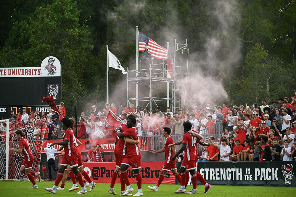 The players of NC State Men's Soccer Team celebrates after scoring a goal during the match against Duke University at Dail Soccer Field on Friday, Sept. 27, 2024. NC State lost to Duke 2-1.