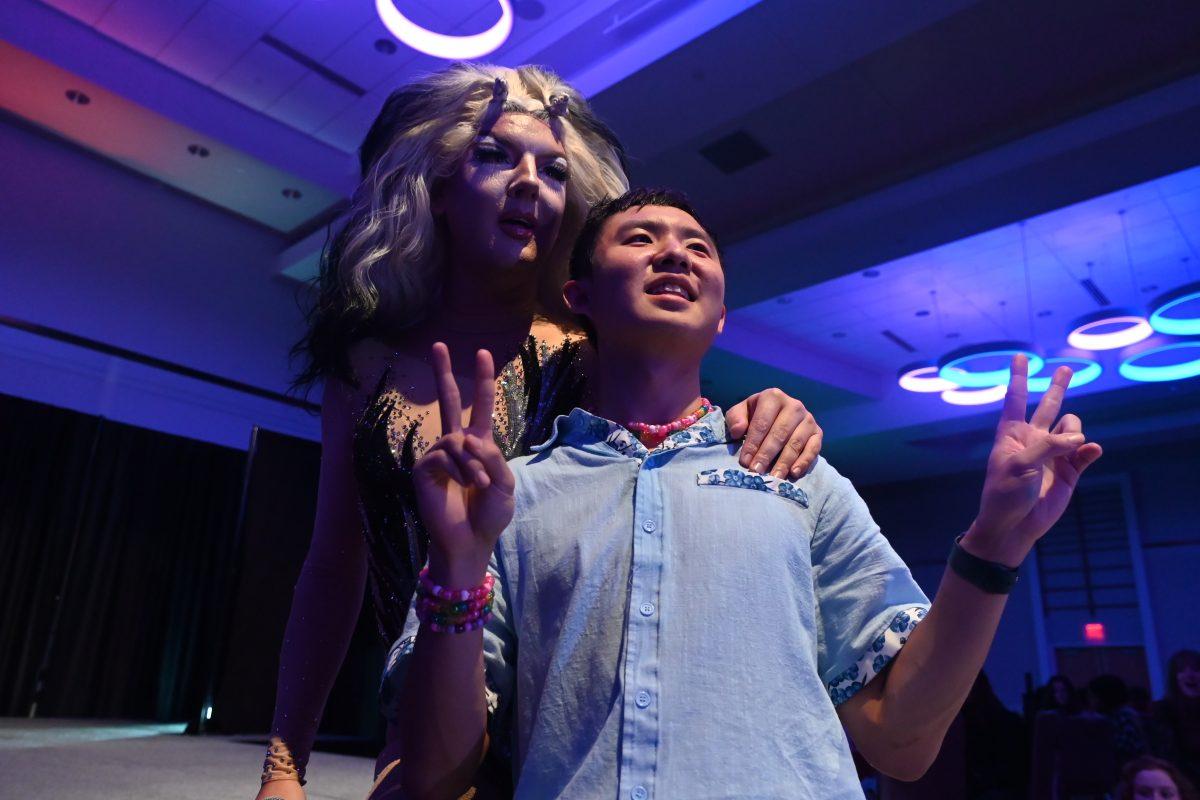Drag queen Brandon Hilton poses with Aaron Chao, a third-year studying statistics at Desserts and Drag in Talley Student Union on Thursday, Sept. 19, 2024. Desserts and Drag was hosted by UAB and featured four drag queens from North Carolina and South Carolina