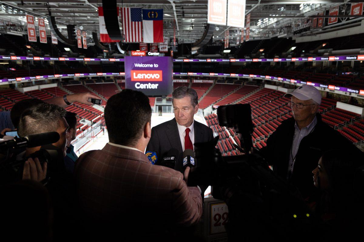 NC Governor Roy Cooper surrounded by media at the Lenovo Center unveiling on Thursday, Sept. 19, 2024. Governor Cooper attended to support the NC Centenial authority and Lenovo as they unveil their new naming partnership.