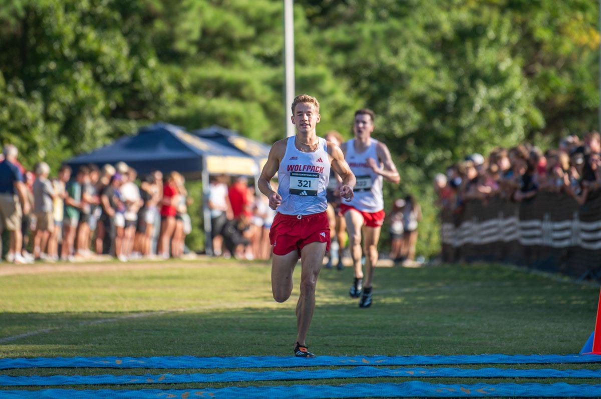 Graduate Brett Gardner crosses the finish line during the Adidas XC Challenge at WakeMed Soccer Park on Friday, Sept. 20, 2024. Gardner finished first place with a time of 17:37.2. The NC State men's team finished in second place with a total of 51 points.