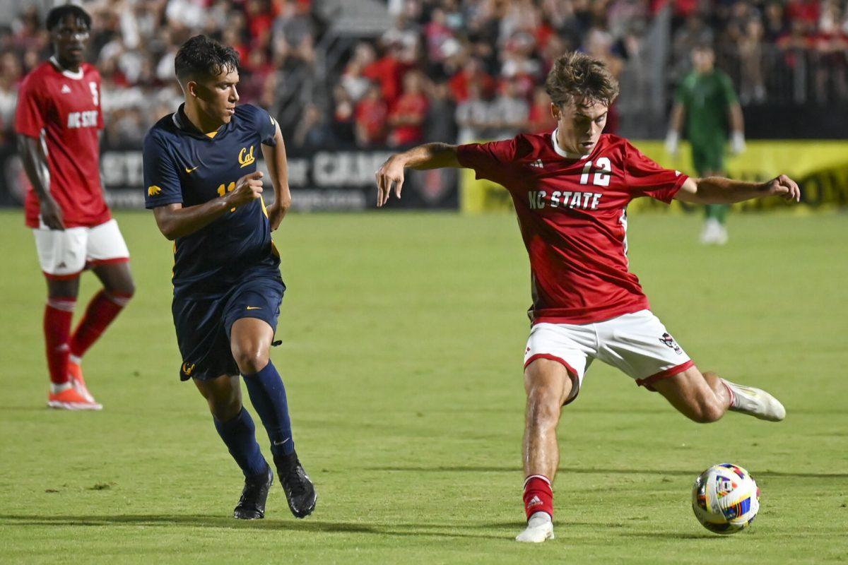 Junior midfielder Taig Healy passes the ball during the game against Cal at Dail Soccer Field on Friday, Sept. 6, 2024. Healy attempted two shots on the goal. NC State beat Cal 2-1.