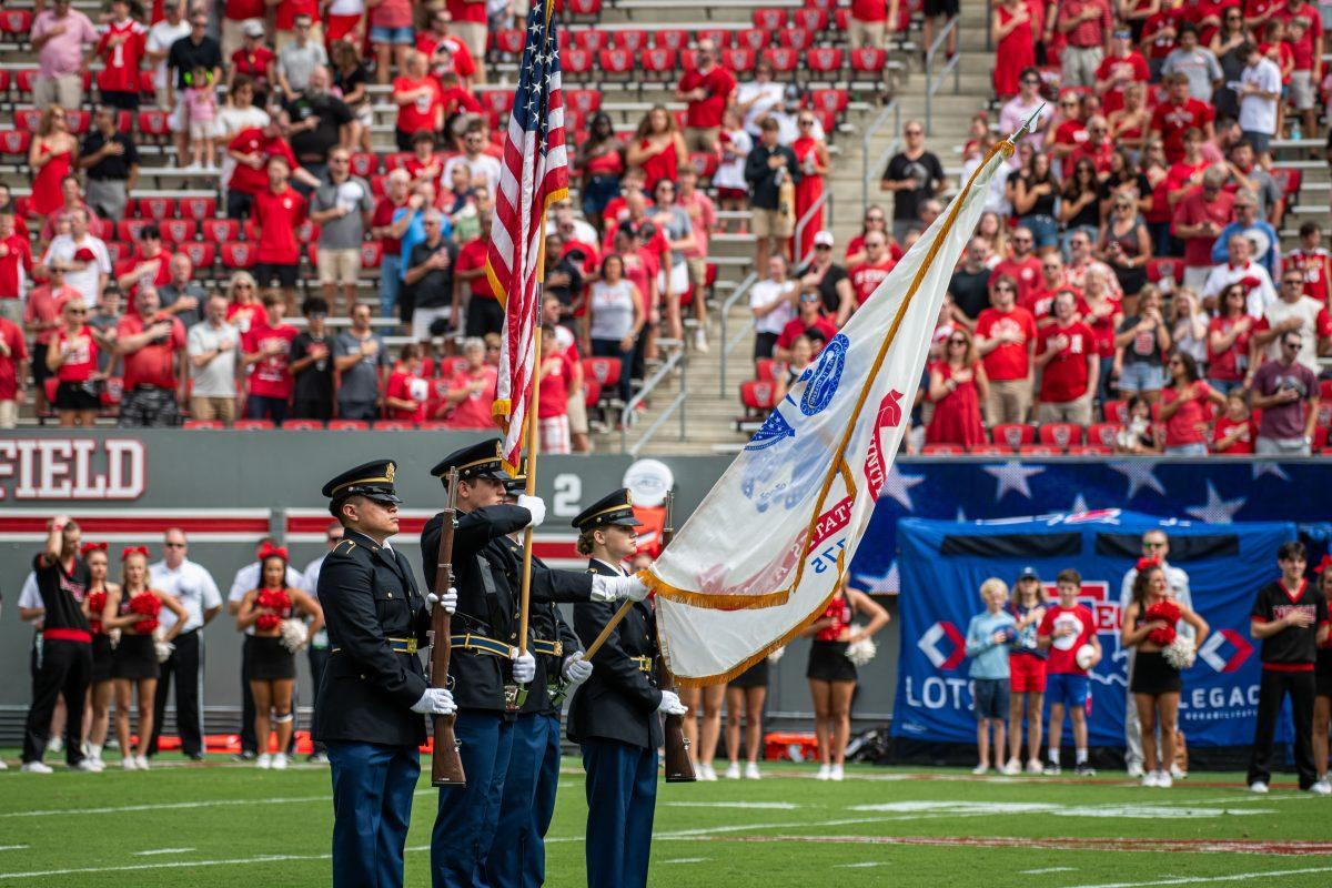 Members of the NC State Army ROTC Color Guard present the colors for the national anthem during the game against LA Tech at Carter-Finley Stadium on Saturday, Sept. 14, 2024. The Wolfpack beat the Bulldogs 30-20
