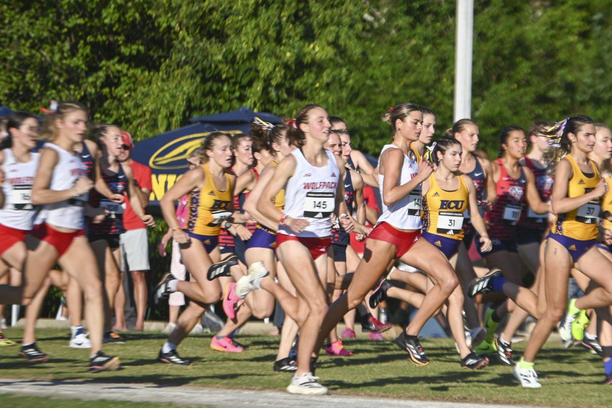 Junior runners Hannah Gapes and Grace Hartman launch off the start line during the Adidas XC Challenge at WakeMed Soccer Park on Friday, Sept. 20, 2024. Hartman finished fourth overall with a time of 16:25.9 and Gapes finished fifth overall with a time of 16:26.5 The NC State women's team finished in first place with a total of 34 points.