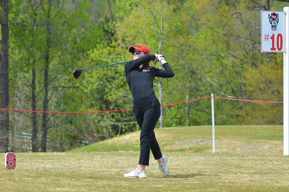 Senior Natalie Ambruester tees off during the match versus Louisville in the Wolfpack Match Play semifinals at Lonnie Poole Golf Course&#160;on Monday, April 3, 2023. Ambruester lost her final match versus Florida State 1-up. NC State beat Louisville 3-1-1 in the semifinals and beat FSU 3-2-0 in the finals.