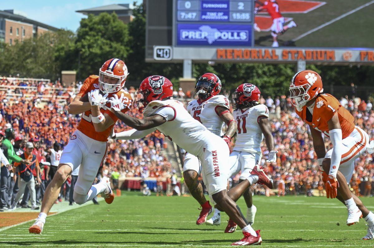 Redshirt junior Sean Brown tries to push his opponent out of bounds during the football game against Clemson in Memorial Stadium on Saturday, Sept. 21, 2024. Brown had five tackles total and one sack.&#160;Clemson beat NC State 59-35.