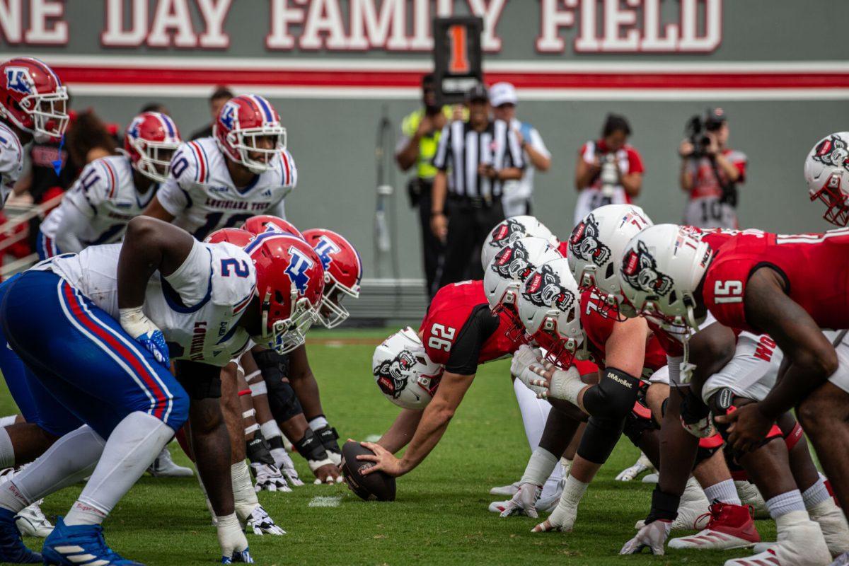 Junior tight end Jack Cook prepares to snap the ball during the game against LA Tech at Carter-Finley Stadium on Saturday, Sept. 14, 2024. The Wolfpack beat the Bulldogs 30-20.