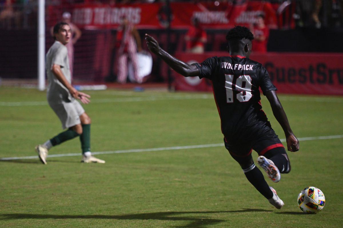Senior defender Yves Tcheuyap reaches the pinnacle of his kick during NC State's game against Stetson University at Dail Soccer Field on Friday, Sept. 13, 2024. The Wolfpack tied with the Hatters 1-1.