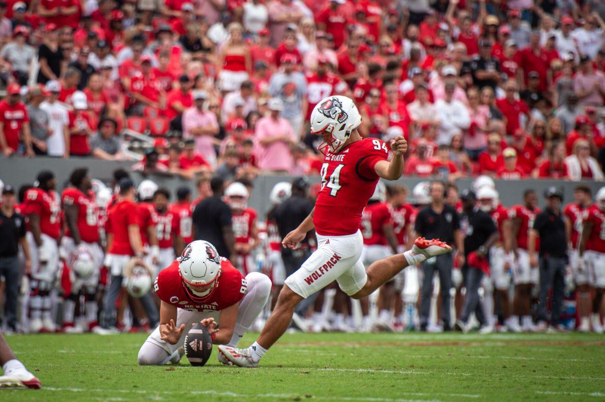 Redshirt sophomore kicker Kanoah Vinesett kicks the ball to score the extra point during the game against LA Tech at Carter-Finley Stadium on Saturday, Sept. 14, 2024. Vinesett made three field goals during the game. The Wolfpack beat the Bulldogs 30-20.