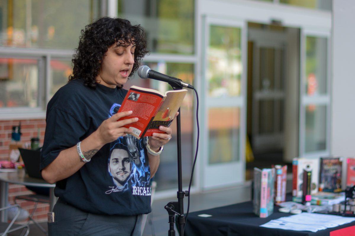 Lara Fountaine, Community Engagement Librarian at NC State, reads a passage out of Margaret Atwood's The Handmaid's Tale during the NCSU Libraries Banned Books Read-out at D.H. Hill Jr. Library on Monday, Sept. 23, 2024. The Handmaid's Tale is banned in several US states for sexually explicit content.