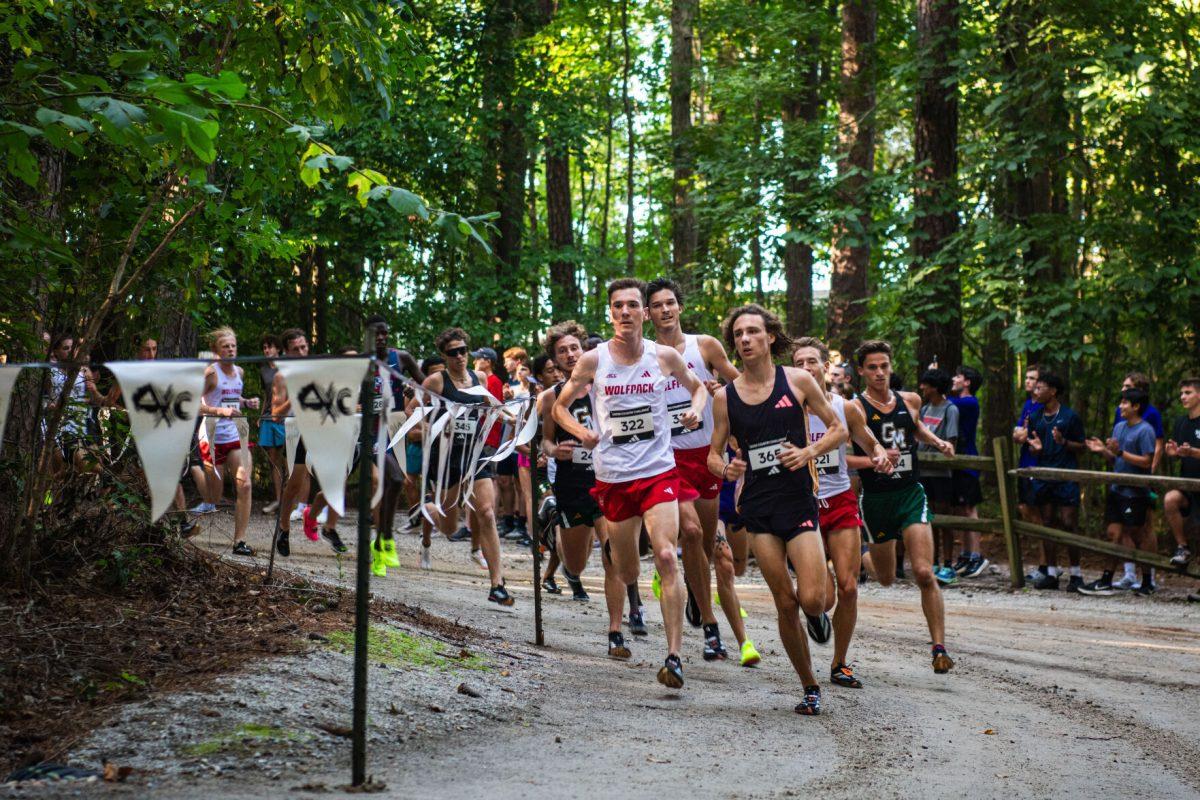 Graduate Toby Gaulter races around the corner during the Adidas XC Challenge at WakeMed Soccer Park on Friday, Sept. 20, 2024. Gaulter finished in second place with a time of 17:39.4. The NC State men's team finished in second place with a total of 51 points.