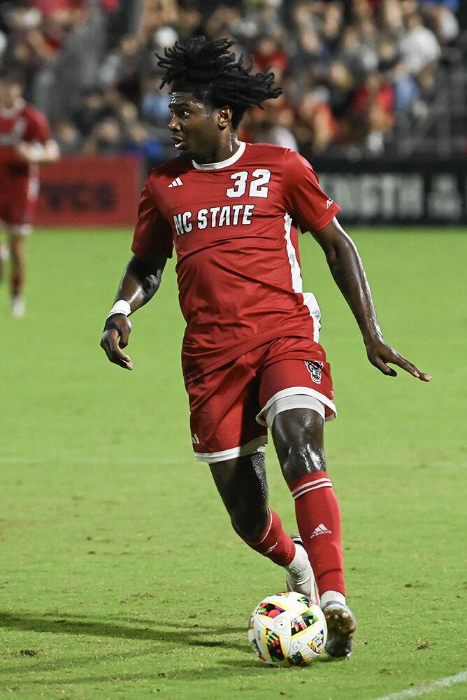 Sophmore forward Donavan Phillip dribbles the ball upfield during the match against Duke University at Dail Soccer Field on Friday. Sept. 27th, 2024. Phillip had two shots on goal. NC State lost to Duke 2-1.