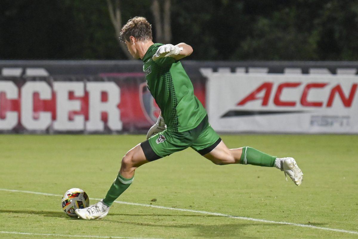 Junior goalkeeper Logan Erb kicks the ball during the game against Cal at Dail Soccer Field on Friday, Sept. 6, 2024. Erb made three saves. NC State beat Cal 2-1.