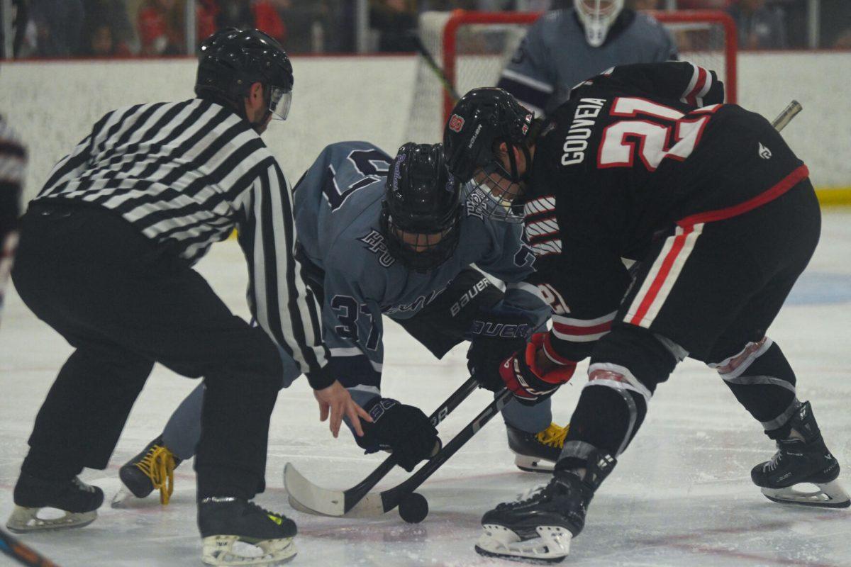Senior forward Joey Gouveia takes a faceoff during the game against High Point University at Invisalign Arena on Friday, Sept. 6, 2024. Gouveia scored the two goals. NC State won 8-2.