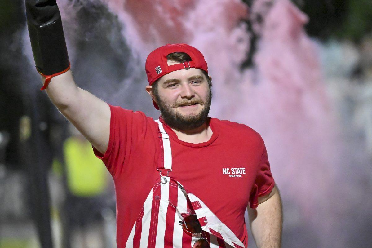 Bishop McGregor, a second-year studying biology, runs past the student section after a goal during the game against Cal at Dail Soccer Field on Friday, Sept. 6, 2024. NC State beat Cal 2-1.