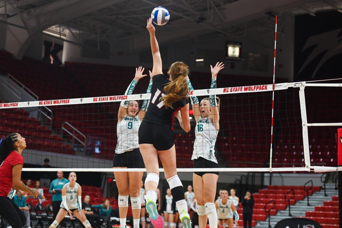 Senior opposite hitter Amanda Rice spikes the ball during the game against Coastal Carolina in Reynolds Coliseum on Sunday, Sept. 22, 2024. Rice had 18 kills. The Wolfpack lost to the Chanticleers 3-2.
