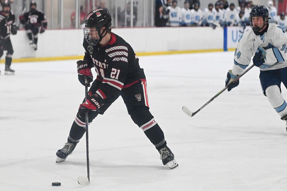 Senior forward Joey Gouveia controls the puck during the game against UNC-Chapel Hill at Invisalign Arena on Friday, Oct. 11, 2024. UNC-Chapel Hill defeated NC State 6-5.