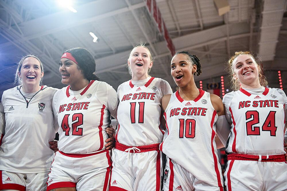 The women's basketball team sings the alma mater after the game against Florida State in Reynolds Coliseum on Thursday, Jan. 4, 2024. NC State beat Florida State 88-80 in overtime.