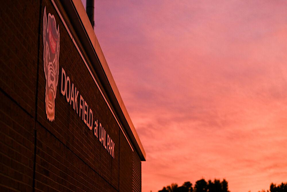 The sun sets over Doak Field at Dail Park on Wednesday, Oct. 9, 2024. Doak Field at Dail Park is the home stadium for the NC State baseball team.