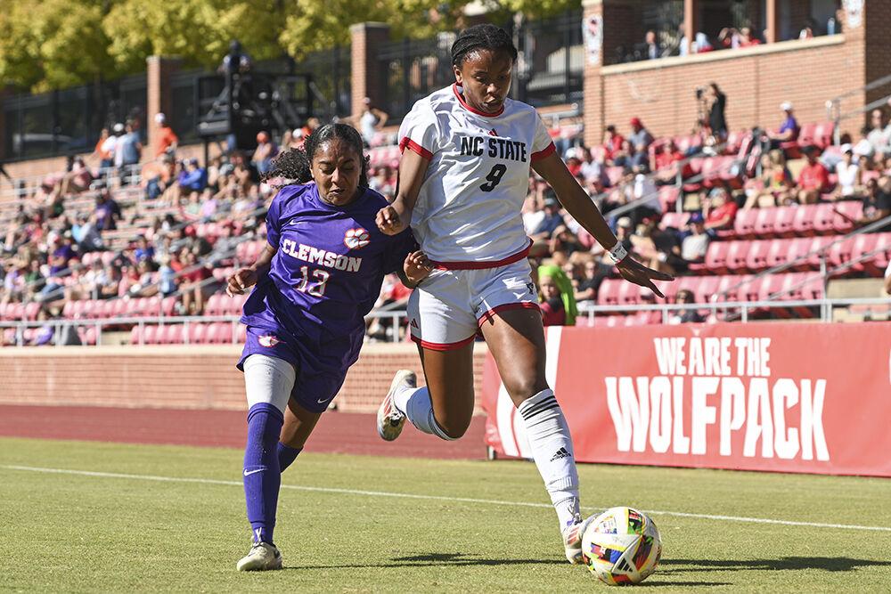 Sophomore forward Hannah Jibril fights her opponent for the ball during the match against Clemson at Dail Soccer Field on Sunday, Oct. 20, 2024. NC State won against Clemson 1-0.