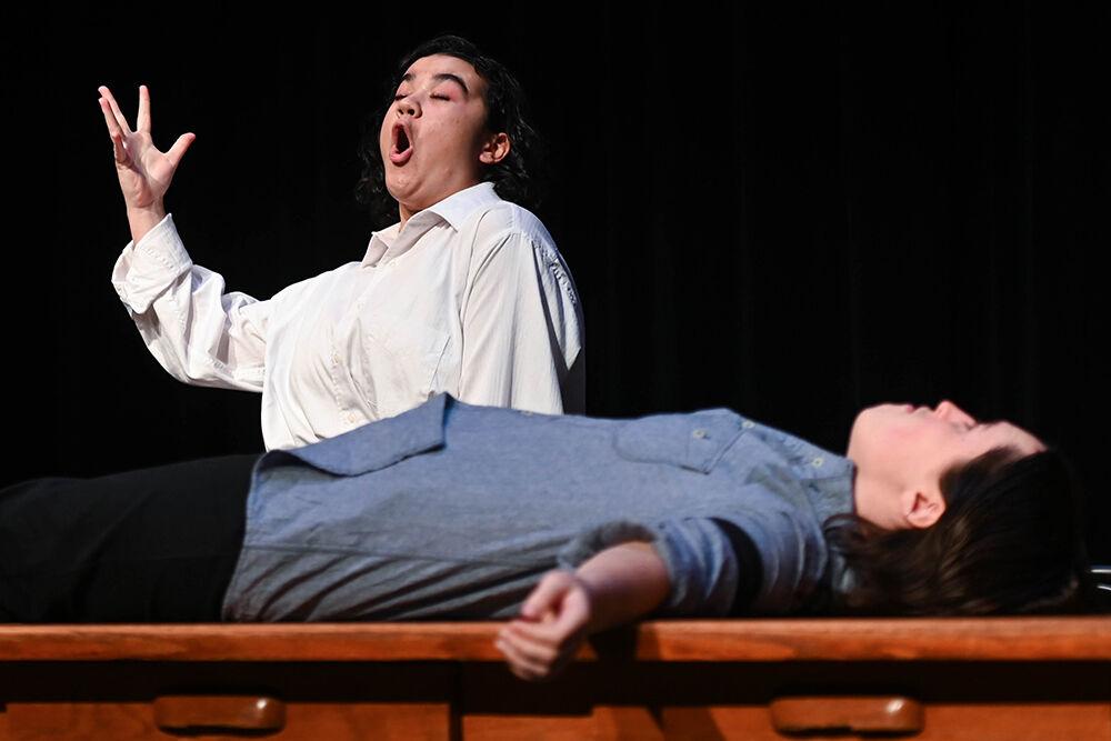 Mackenzie Cayco, a fourth-year studying biology, performs onstage with Kat O'Neil Cupp, a fourth-year in theatre studies and studying communication, during the dress rehearsal of "Teletype" in Kennedy-McIlwee Studio Theater on Wednesday, Oct. 2, 2024. "Teletype" was written by Wyat Hamilton, a fourth-year majoring in civil engineering.