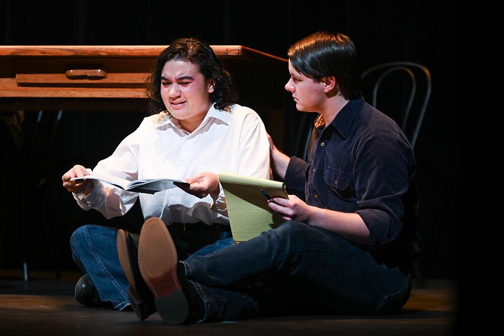 Jacen Yabroff, a sixth-year studying mechanical engineering, comforts Mackenzie Cayco, a fourth-year studying biology, during the dress rehearsal of "Teletype" in Kennedy-McIlwee Studio Theater on Wednesday, Oct. 2, 2024. "Teletype" was written by Wyat Hamilton, a fourth-year majoring in civil engineering.