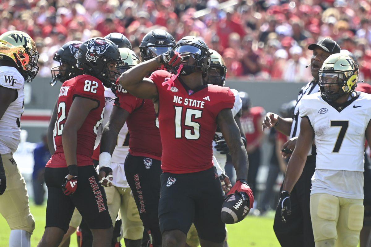 Tight end junior Justin Joly celebrates getting a first down during the football game against Wake Forest in Carter-Finley Stadium on Saturday, Oct. 5, 2024. Joly scored one touchdown. NC State lost to Wake Forest 34-30.
