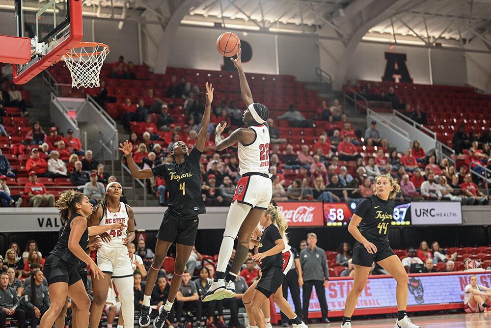 Senior Guard Saniya Rivers attempts a shot on the net during the exhibition&#160;game against Anderson in Reynolds Coliseum on Tuesday, Oct. 29, 2024. Rivers had ten rebounds and scored 14 points. NC State beat Anderson 91-54.