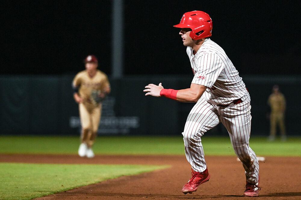 Redshirt sophomore catcher and outfielder Drew Lanphere runs back towards first base during the game against Elon at Doak Field at Dail Park on Wednesday, Oct. 9, 2024. NC State beat Elon 20-4 to win the fall&#160;game at their home stadium.
