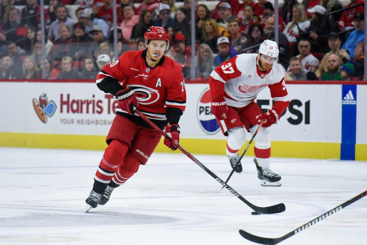 Center Sebastian Aho controls the puck on offense during the game against the Detroit Red Wings in PNC Arena on Thursday, March 28, 2024. The Hurricanes defeated the Red Wings 4-0.