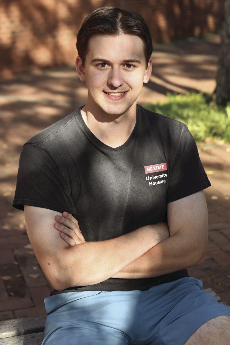 Brian Carss, a graduate student studying communications, sits for a portrait outside of Winston Hall on Monday, Oct. 7, 2024. Brian was interviewed as a part of Technician&#8217;s &#8220;Portraits of the Pack&#8221; series, in which students were asked questions regarding their political views.&#160;