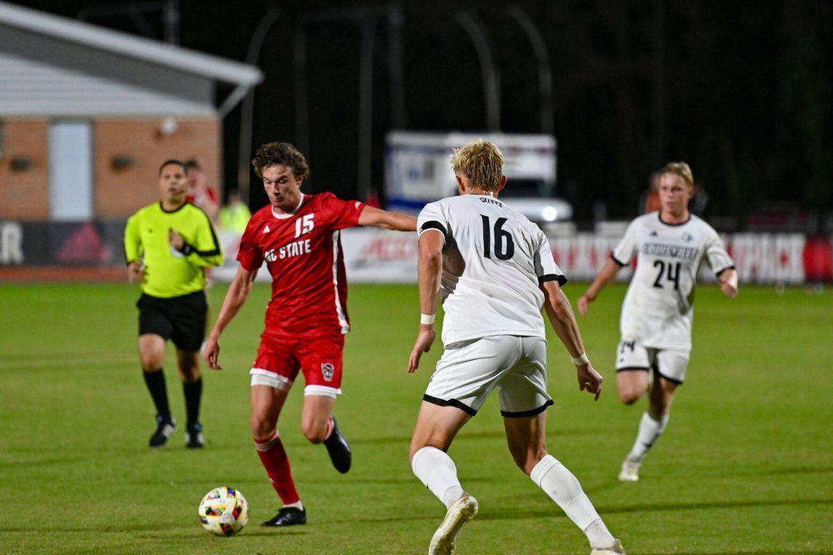 Redshirt junior forward Aidan Payne winds up for a shot during the game against Louisville at Dail Soccer Field on Sunday, Oct. 27, 2024. NC State defeated Louisville 1-0.