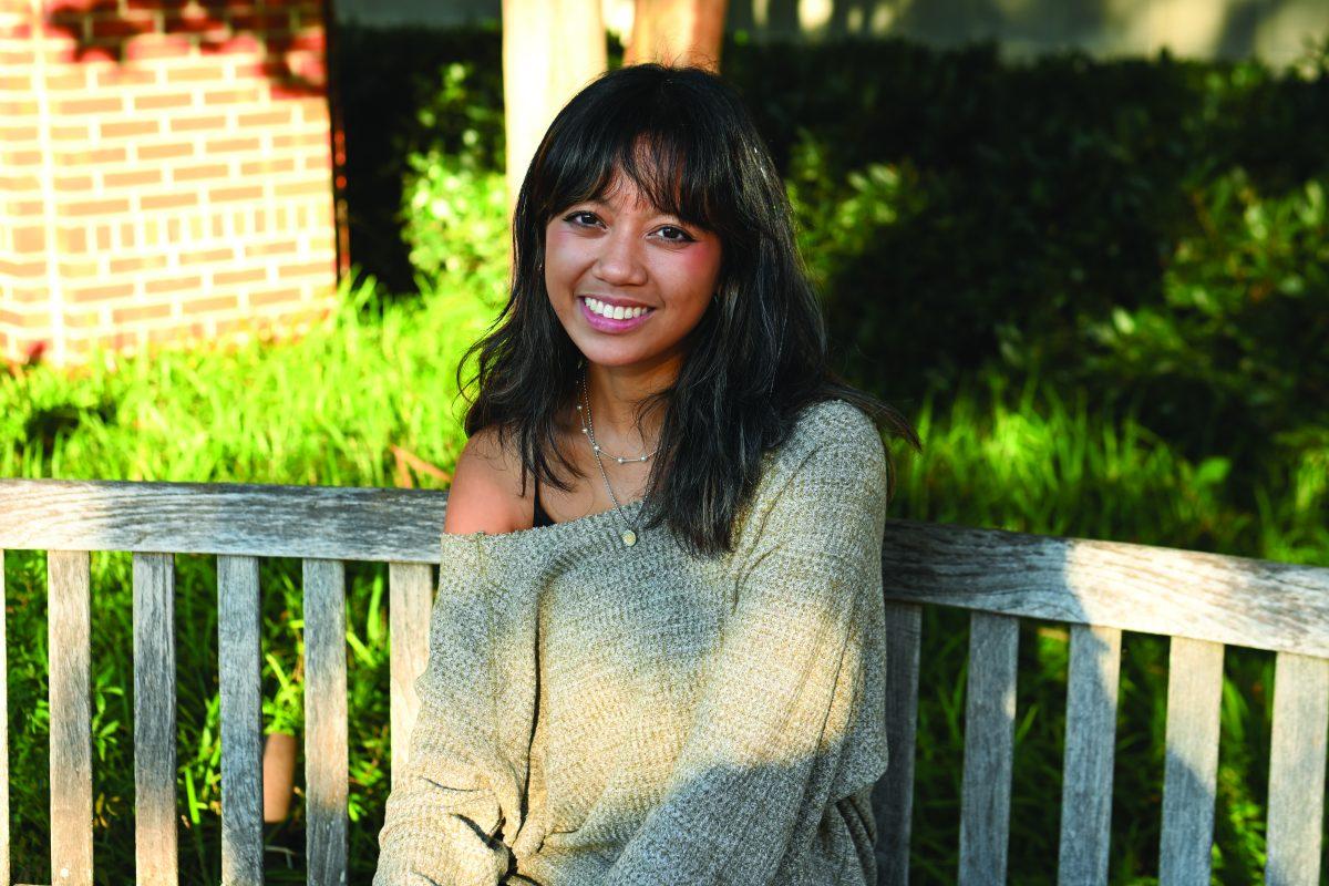 Alexis De Castro, a second-year studying fashion textile management, smiles for a portrait outside of Witherspoon Student Center on Tuesday, Oct. 8, 2024. Alexis was interviewed as a part of Technician&#8217;s &#8220;Portraits of the Pack&#8221; series, in which students were asked questions regarding their political views.&#160;&#160;