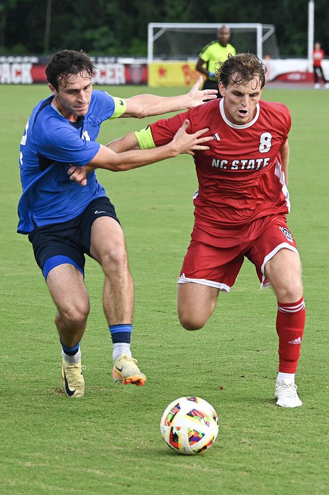 Senior midfielder Will Buete defends his possession during the match against Duke University at Dail Soccer Field on Friday, Sept. 27th, 2024. NC State lost to Duke 2-1.