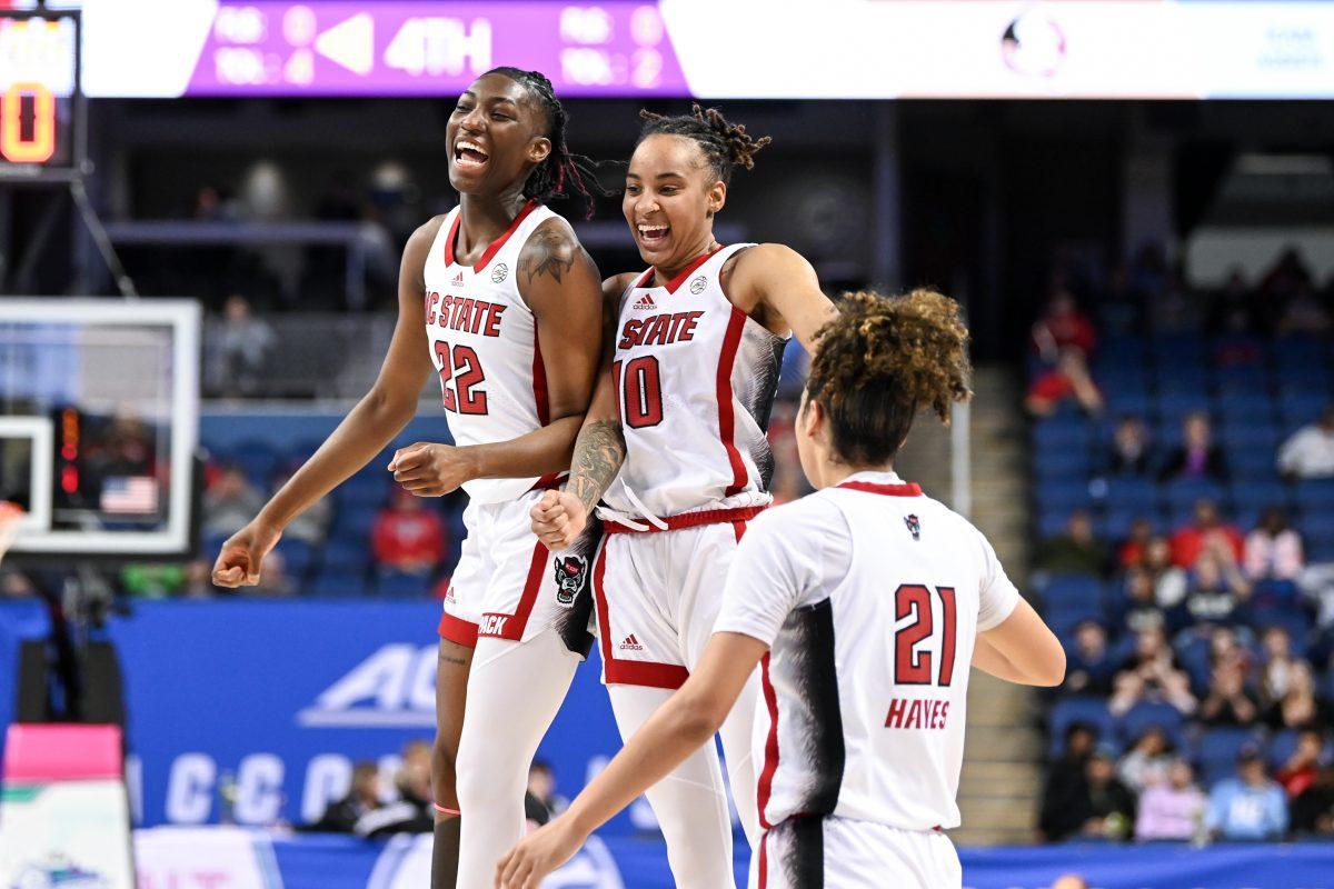 Junior guards Aziaha James and Saniya Rivers jump together in celebration during the ACC Tournament semifinals game against Florida State in Greensboro Coliseum on Saturday, March 9, 2024. James and Rivers combined for 31 points. NC State beat Florida State 69-43.