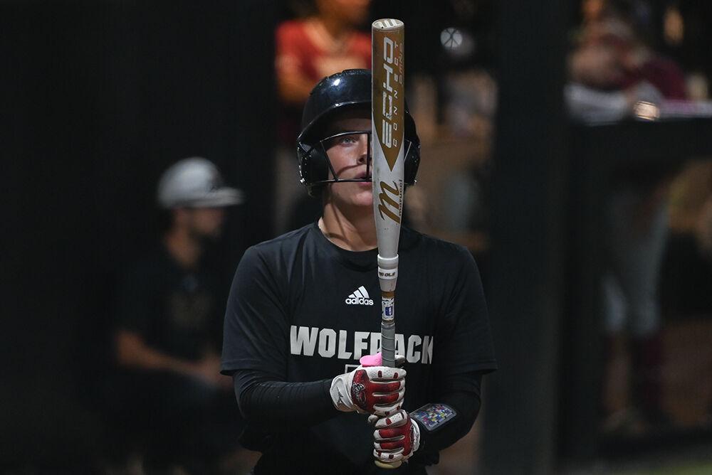 Junior catcher and infielder Ellington Whitaker prepares to bat during the game against Elon at Dail Softball Stadium on Wednesday, Oct. 23, 2024. The Wolfpack won the game 14-7.