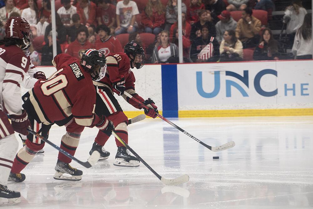 Freshman forward Jake Gifford dribbles the puck ahead of opponents during match against Alabama at Invisalign Arena on Saturday, Oct. 5, 2024. Gifford scored one goal. NC State defeated Alabama 5-2.