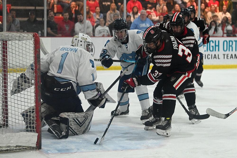 Freshman forward Daniel Prazma (left) scores a goal during the game against UNC-Chapel Hill at the Invisalign Arena on Friday Oct. 11, 2024. NC State lost to UNC-Chapel Hill 6-5.