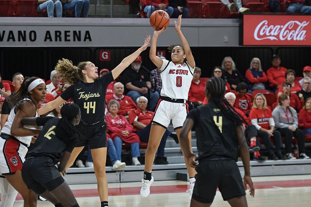 Freshman guard Devyn Quigley shoots the ball during the exhibition&#160;game against Anderson in Reynolds Coliseum on Tuesday, Oct. 29, 2024. The Wolfpack beat the Trojans 91-54.
