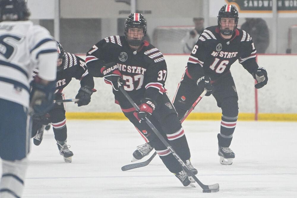 Freshman forward Daniel Prazma makes a break down the ice during the game against the University of New Hampshire at Invisalign Arena on Friday, Oct. 18, 2024. The Wolfpack lost to the Wildcats 4-3.