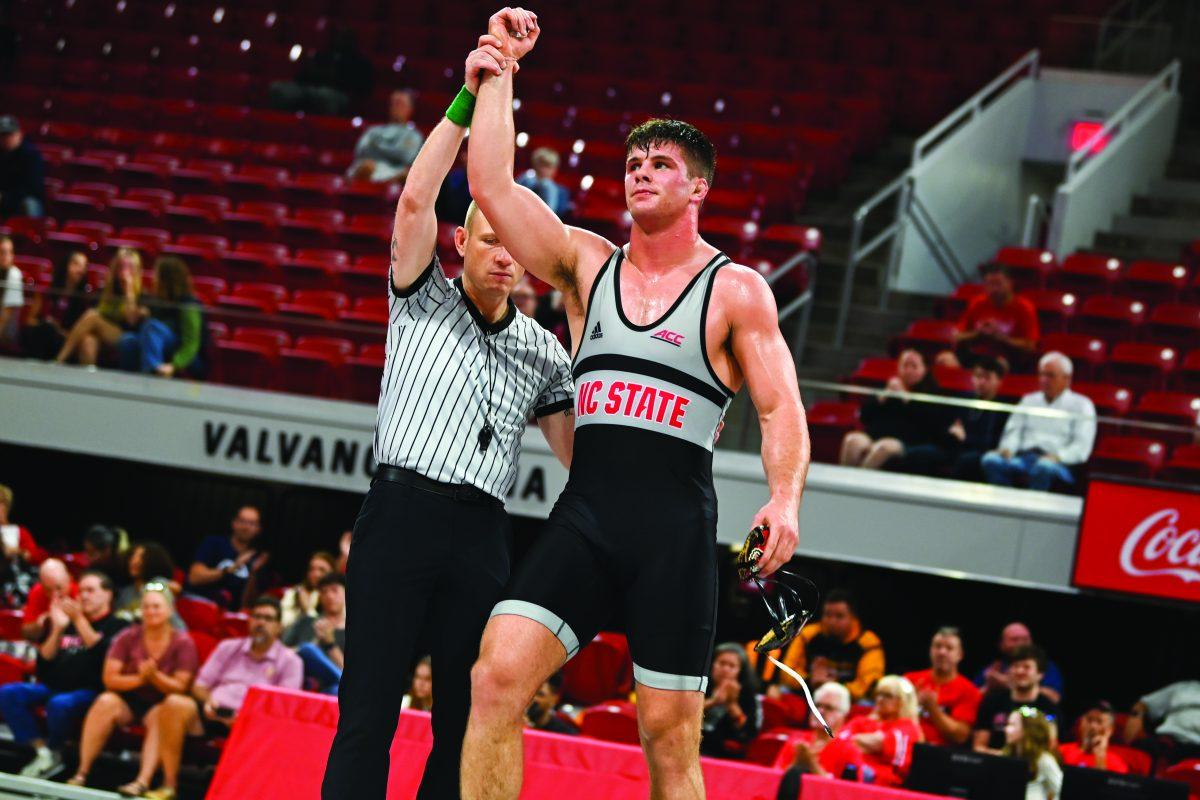 Redshirt junior Isaac Trumble celebrates his Wrestle-Offs duel win in Reynolds Coliseum on Saturday, Oct. 26, 2024. Trumble won 4-0.