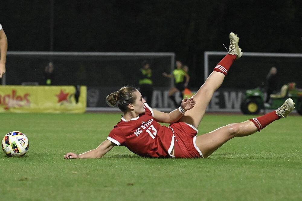Sophomore forward Jade Bordeleau slides on the pitch after being fouled during the match against Virginia Tech at Dail Soccer Field on Thursday, Oct. 24, 2024. Bordeleau had two shots with one shot on goal. The Wolfpack tied the Hokies 0-0.