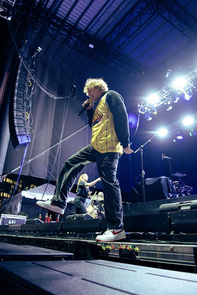 Knox steps onto speakers during his concert at Red Hat Amphitheater on Friday, Oct. 25, 2024. Knox performed as the opener for Quinn XCII's "All You Can Eat" tour.